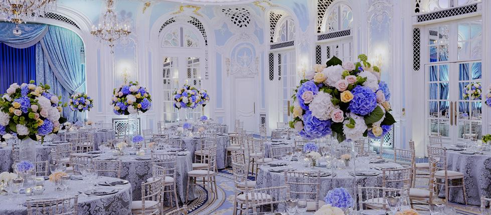 Elegant Lancaster Ballroom with floral centerpieces, perfect for upscale weddings and events.