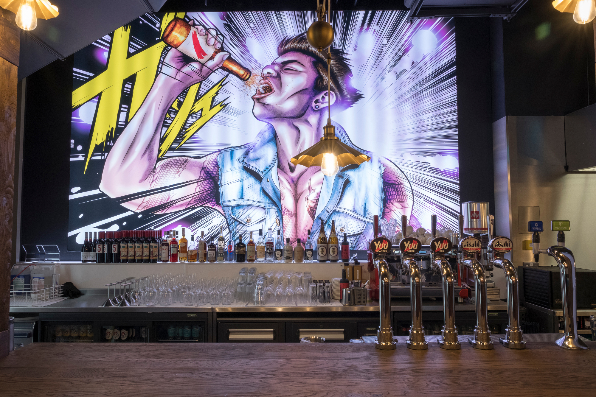 Full Venue Hire at Yuu Kitchen with vibrant mural, ideal for social events and networking.