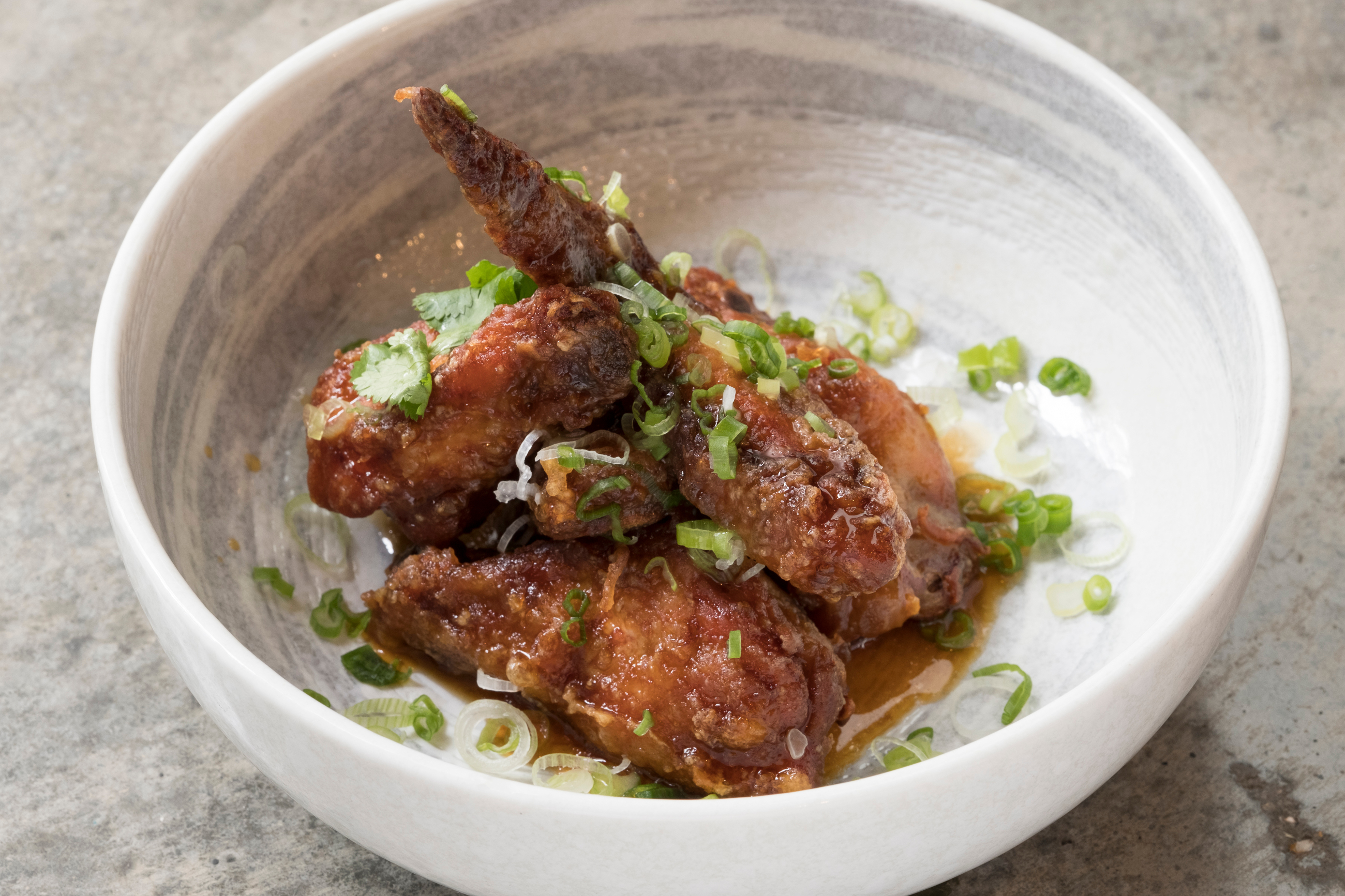 "Beautifully presented chicken wings at Yuu Kitchen for events and catering."
