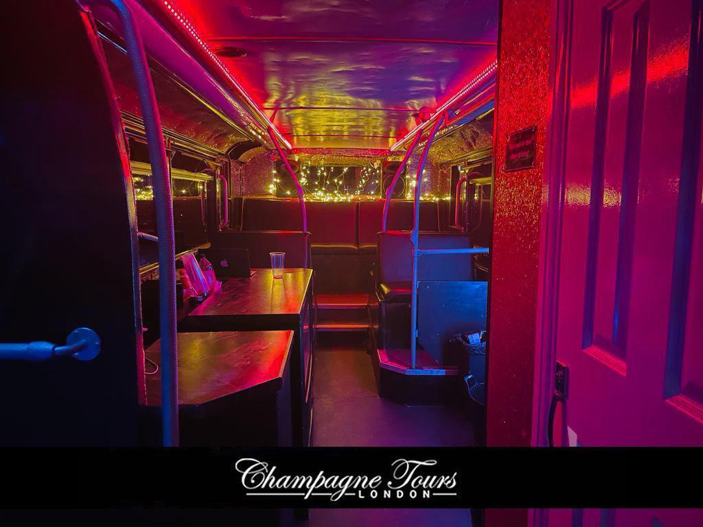 Luxury double-decker party bus interior with LED lights for corporate events in London.