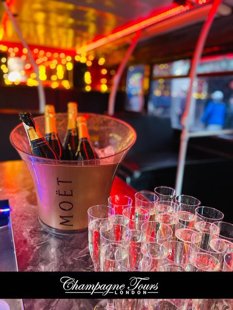 Luxury double-decker bus with champagne for upscale London tours and corporate events.