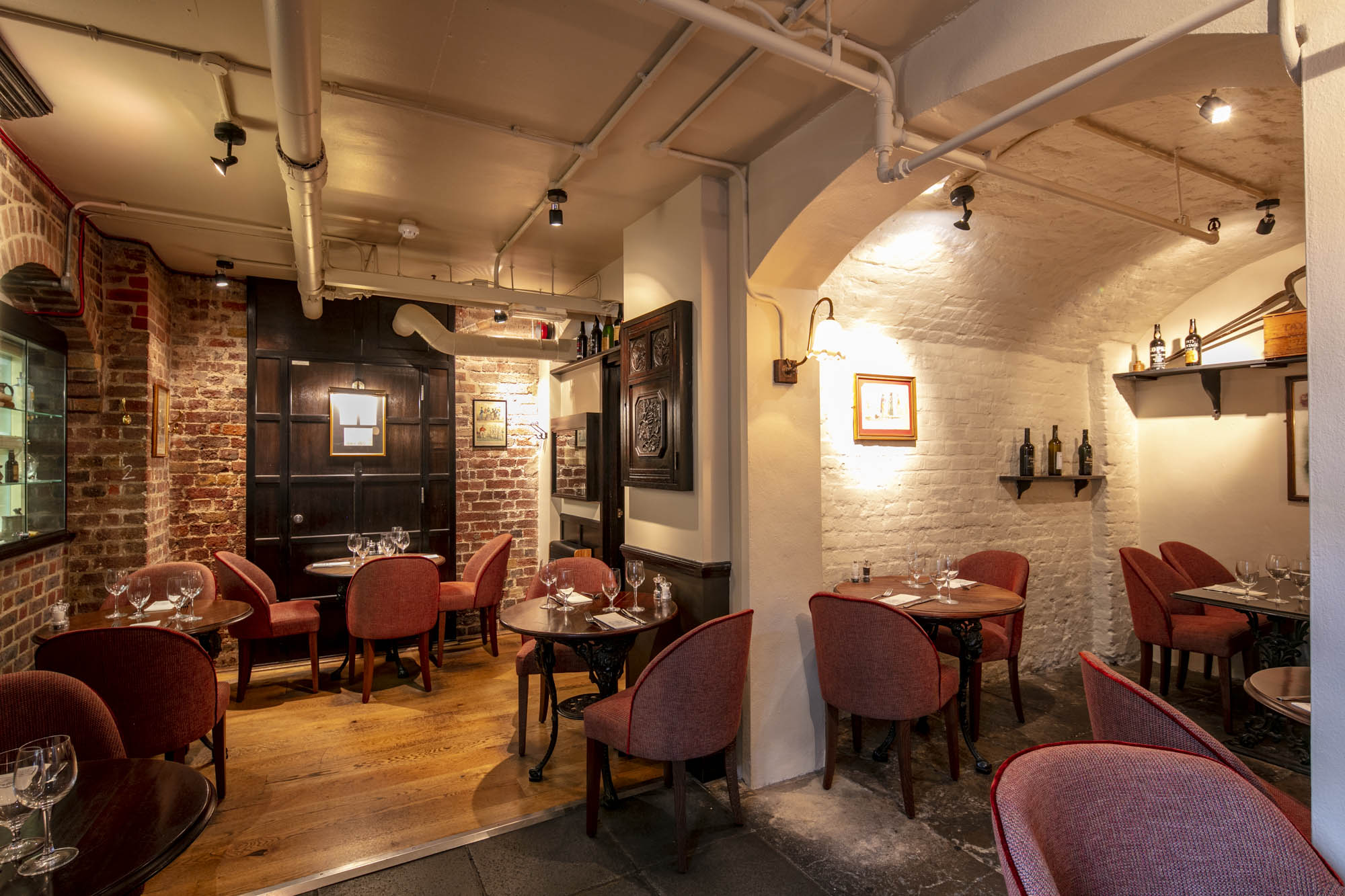 Cozy dining space in Crusting Pipe, Covent Garden for private events and networking dinners.