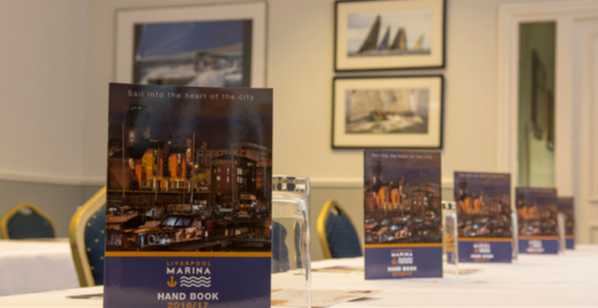 Brunswick Suite meeting setup with handbooks, perfect for corporate events and collaboration.