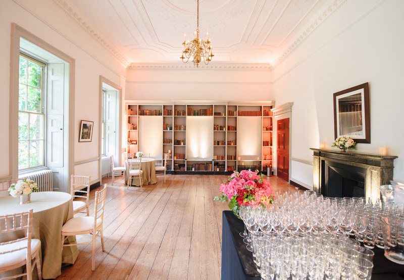 Elegant event space at Fulham Palace with chandelier, ideal for receptions and gatherings.