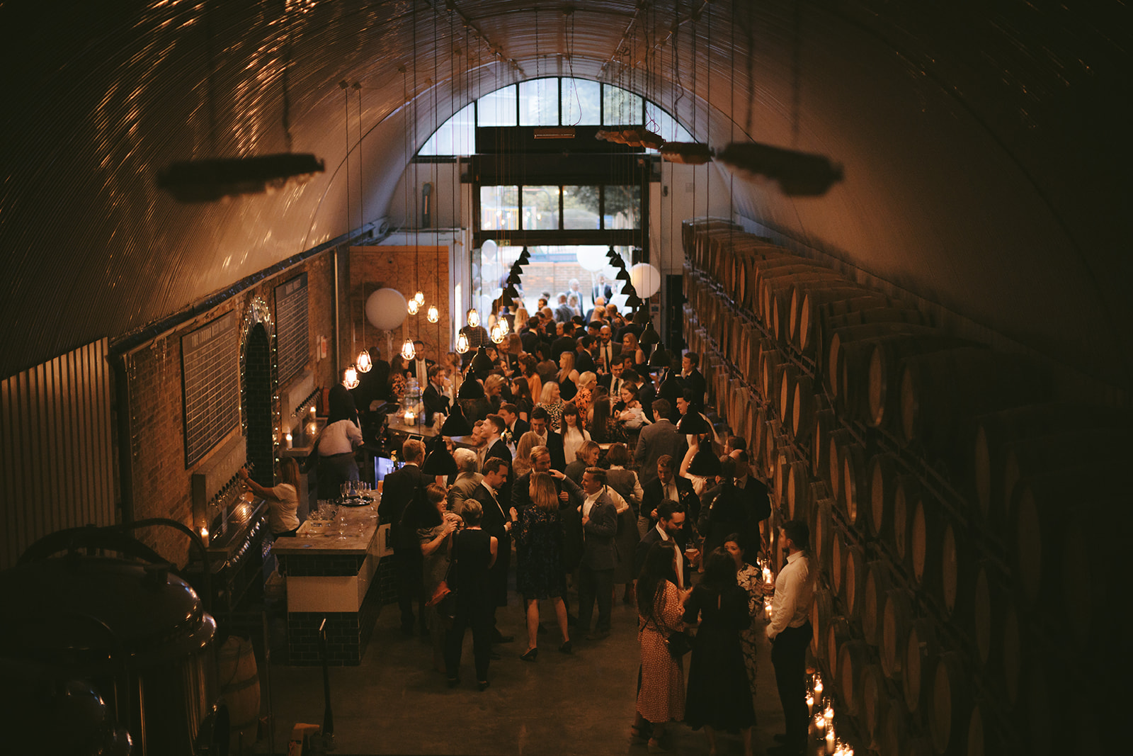 Vibrant industrial event space at The Barrel Project, ideal for networking and gatherings.
