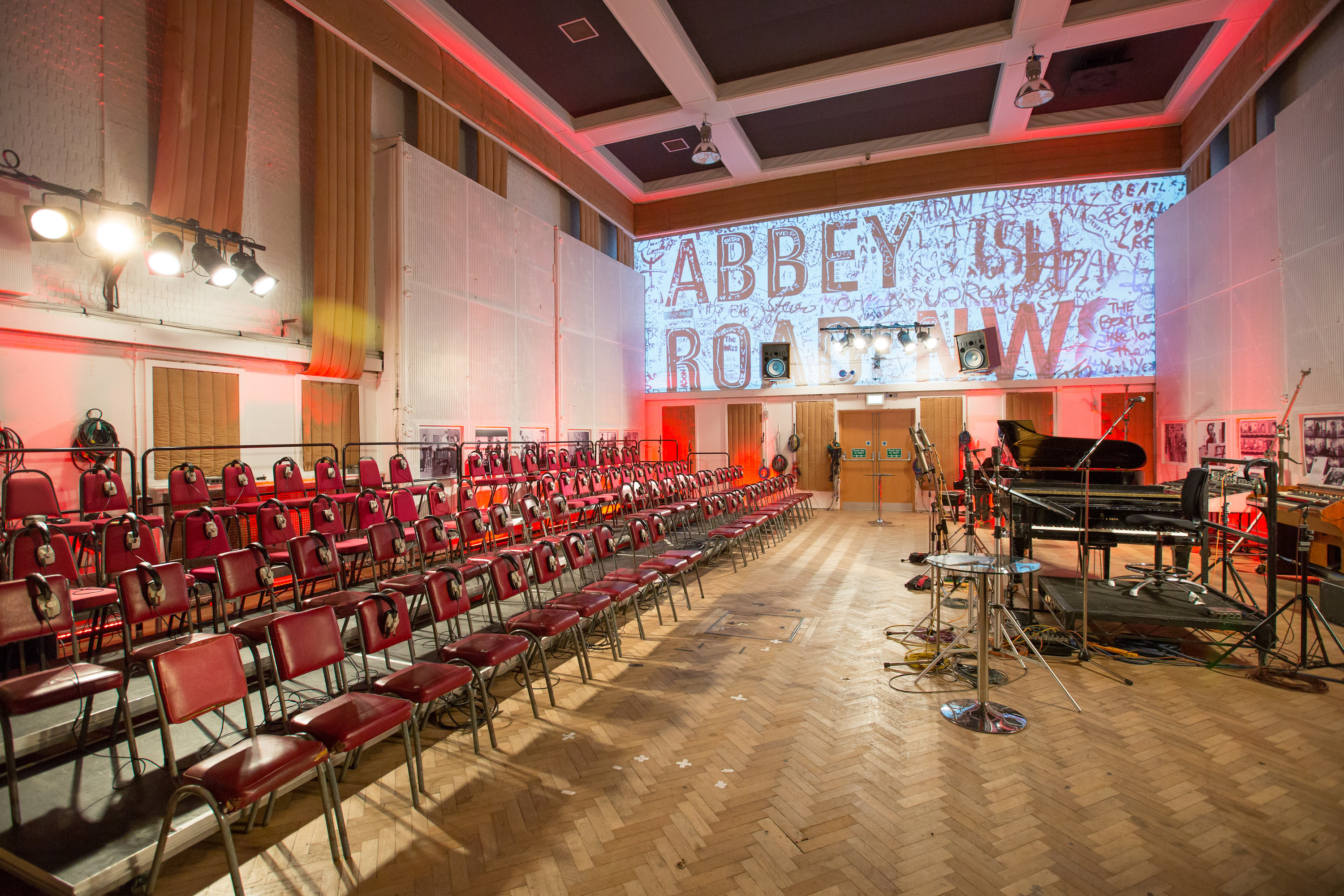 Abbey Road Studios' Studio Two event space with red chairs for a concert or presentation.