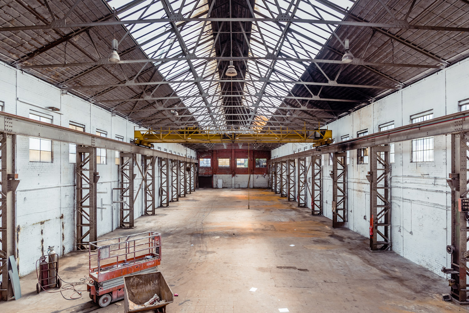 Spacious industrial venue with high ceilings for creative events at The Rainbow Venues.