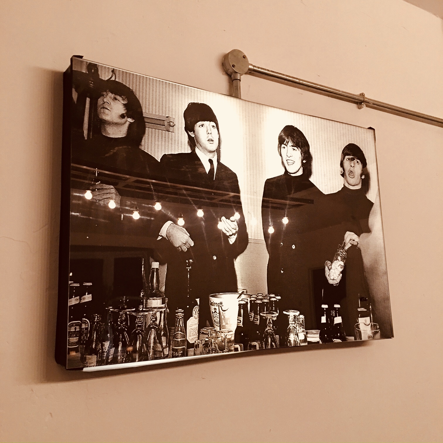 Vintage black-and-white music group photo at Dovedale Towers event venue.