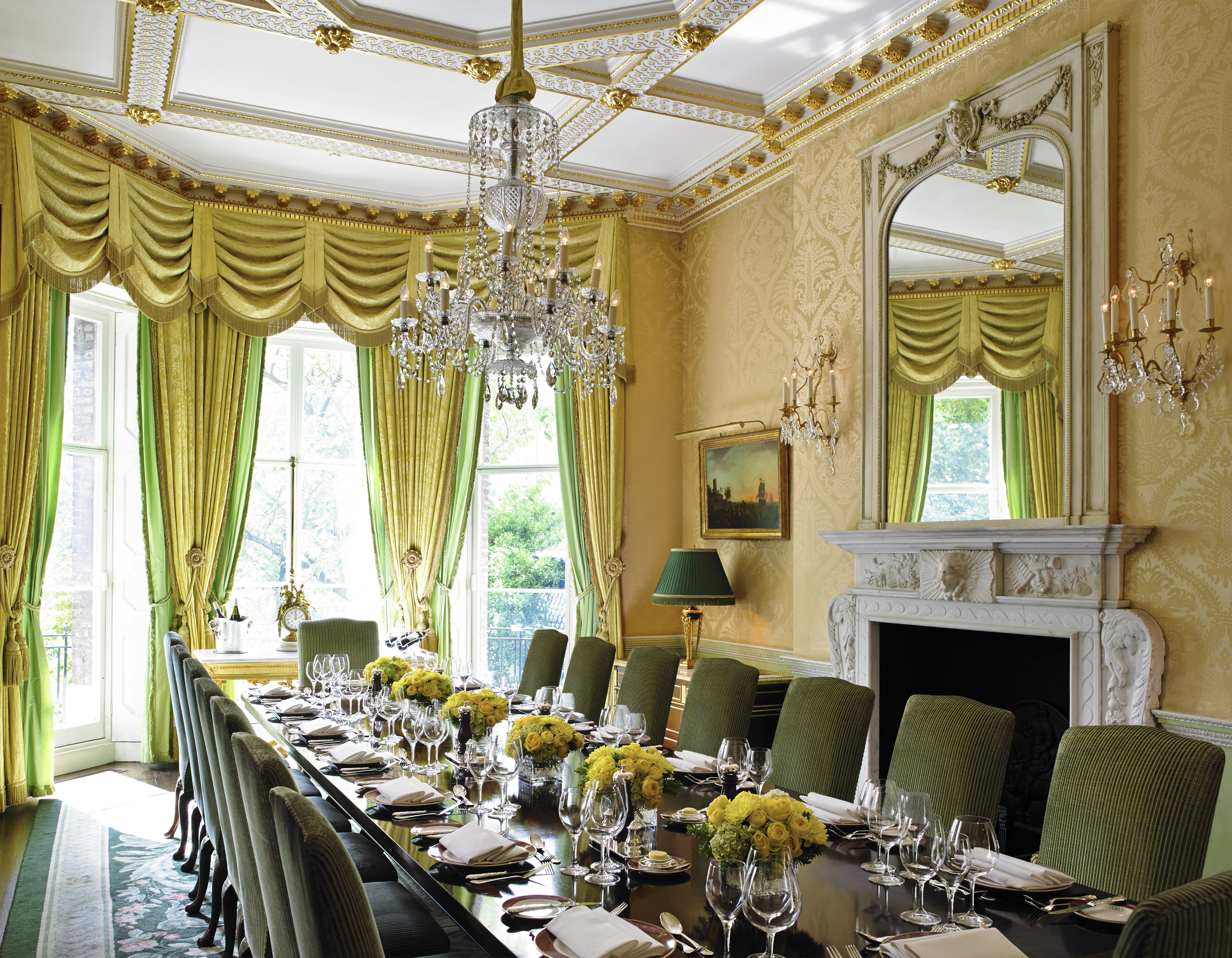 Luxurious dining room at The Ritz London with green drapery for upscale events.