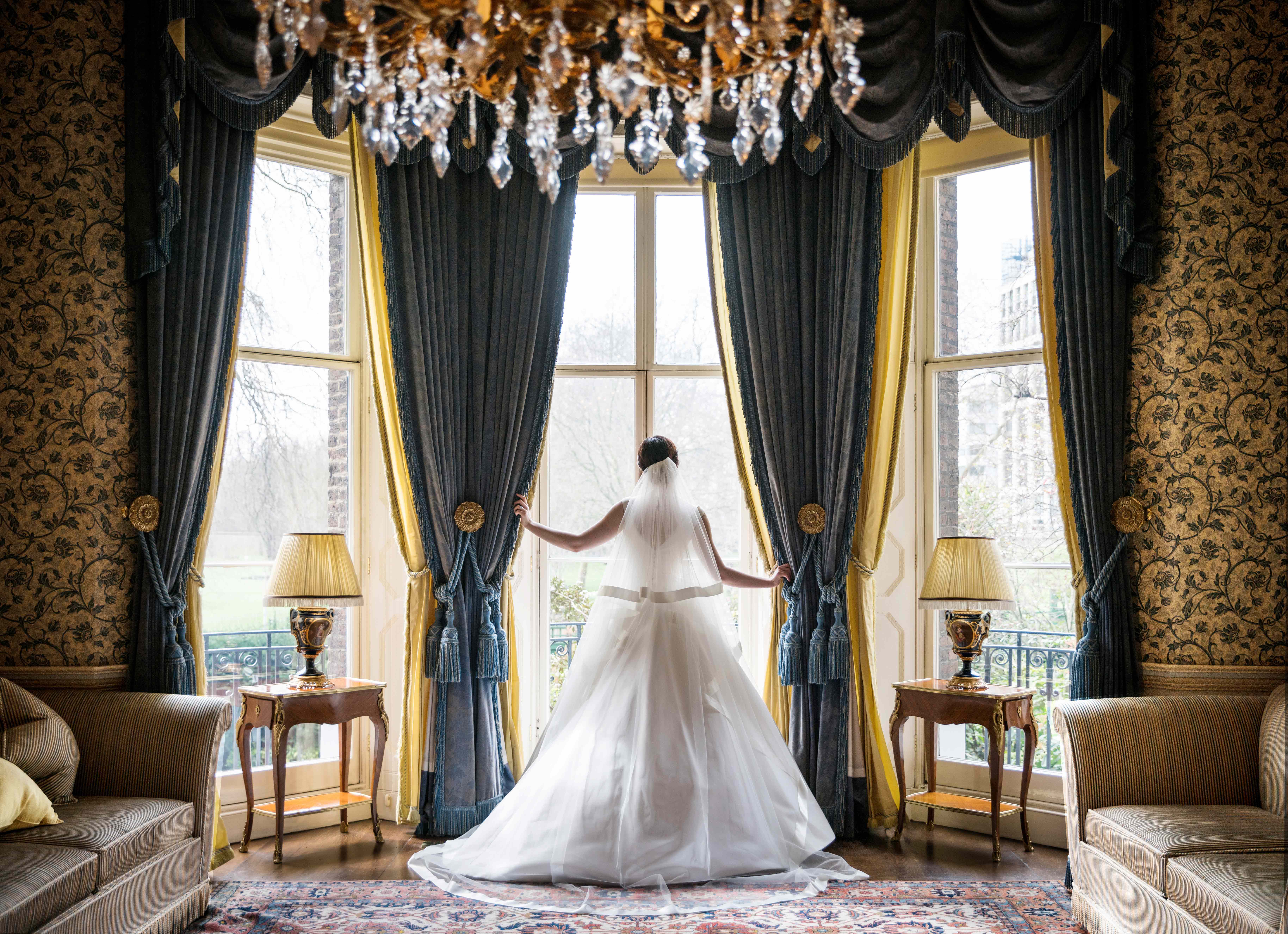 Bridal silhouette in The Queen Elizabeth Room at The Ritz London, perfect for weddings.