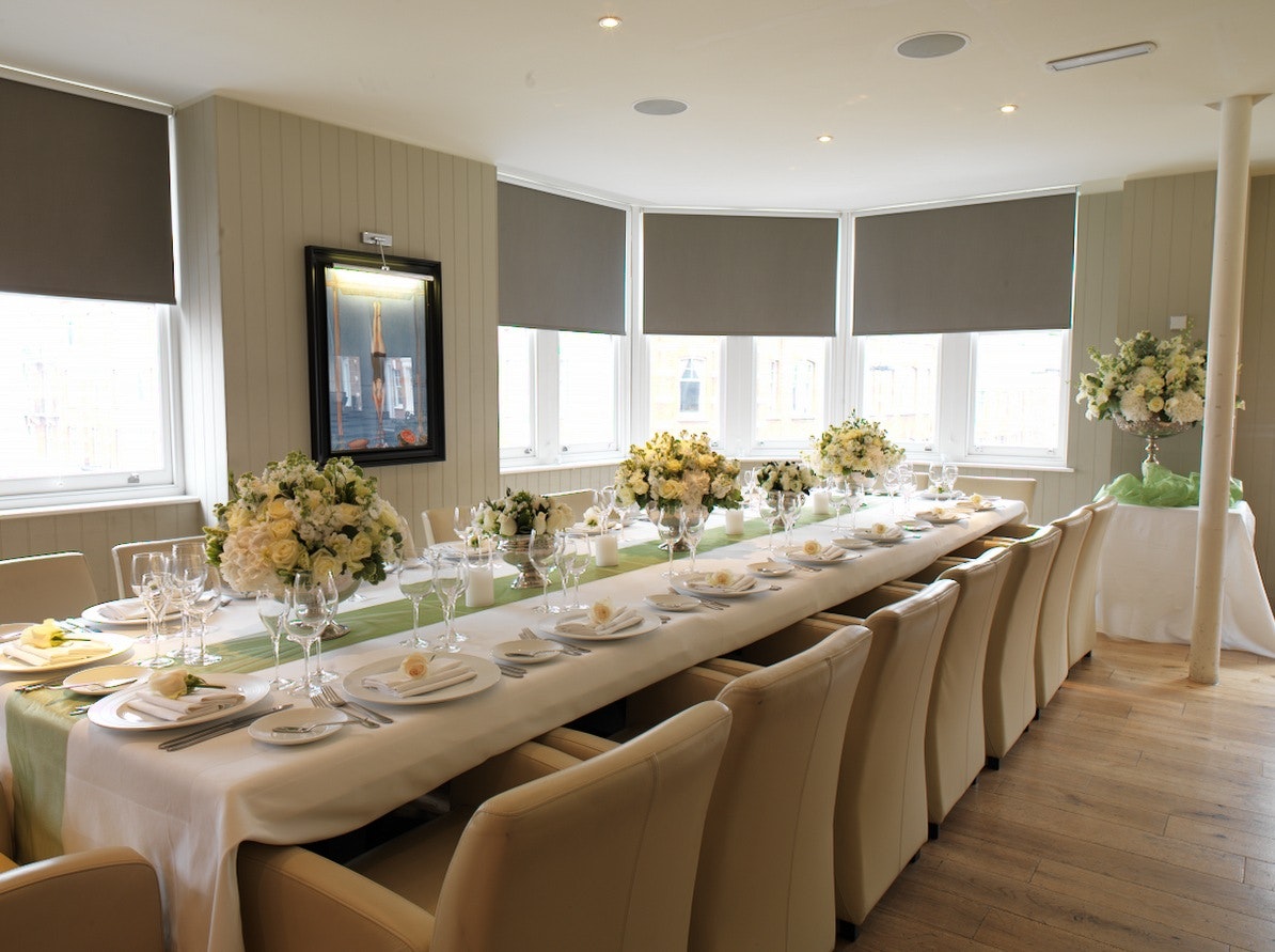 Private dining room at Alberts Club, elegant table setting for corporate events and private dinners.