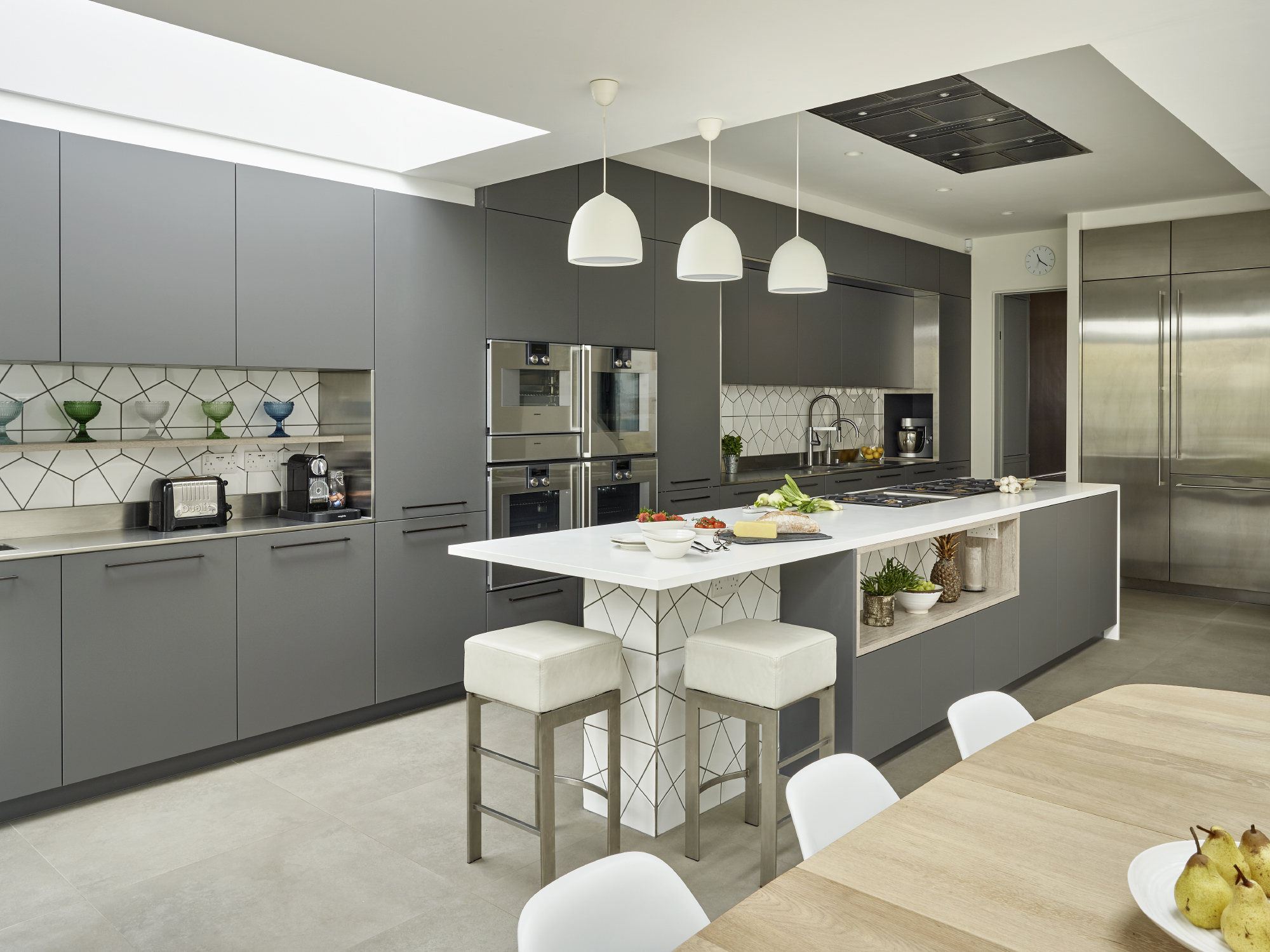 Modern kitchen with sleek cabinetry for cooking classes and culinary events.