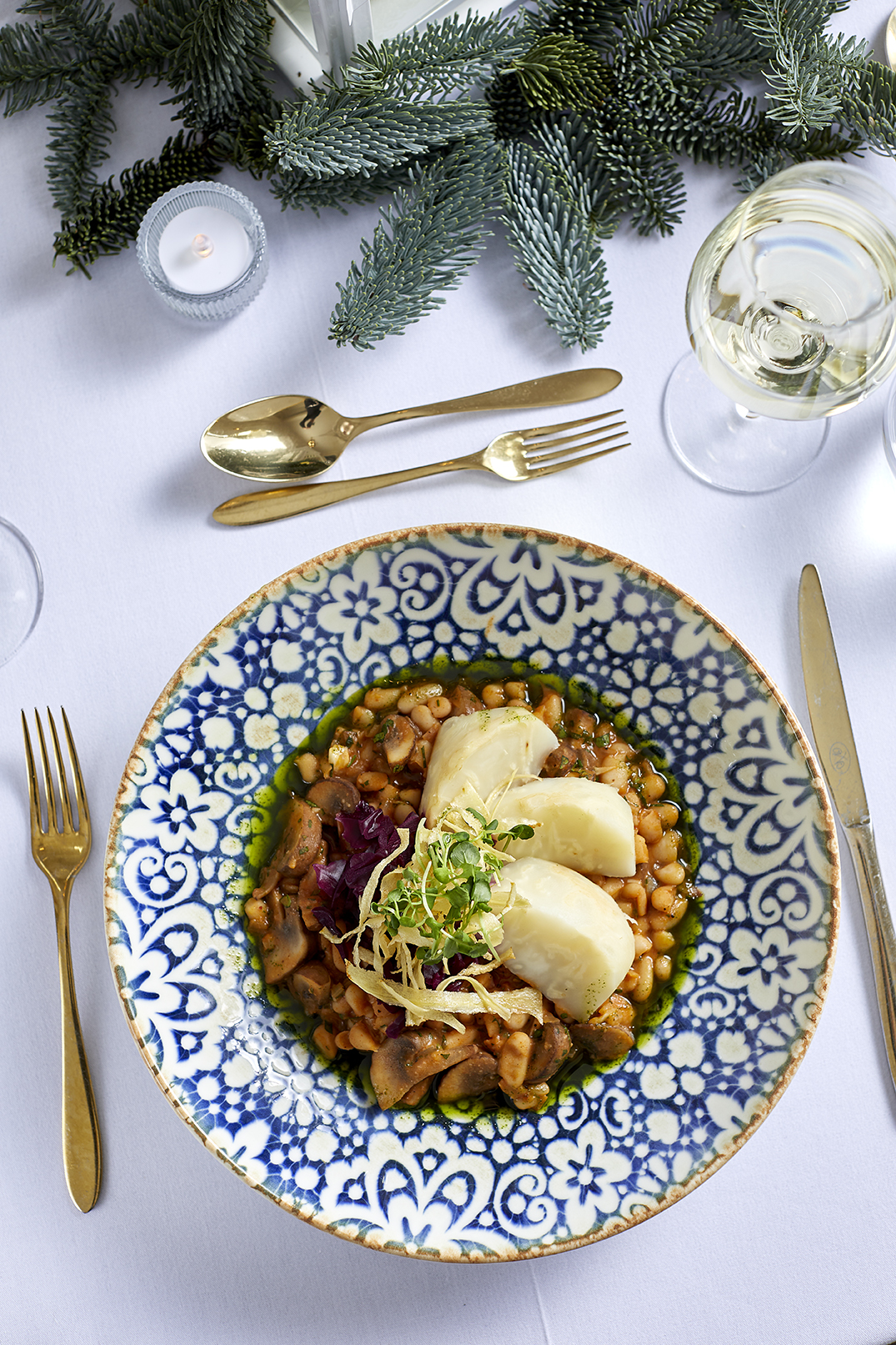 Elegant Christmas dinner at 41 Portland Place with gourmet dish and upscale table setting.