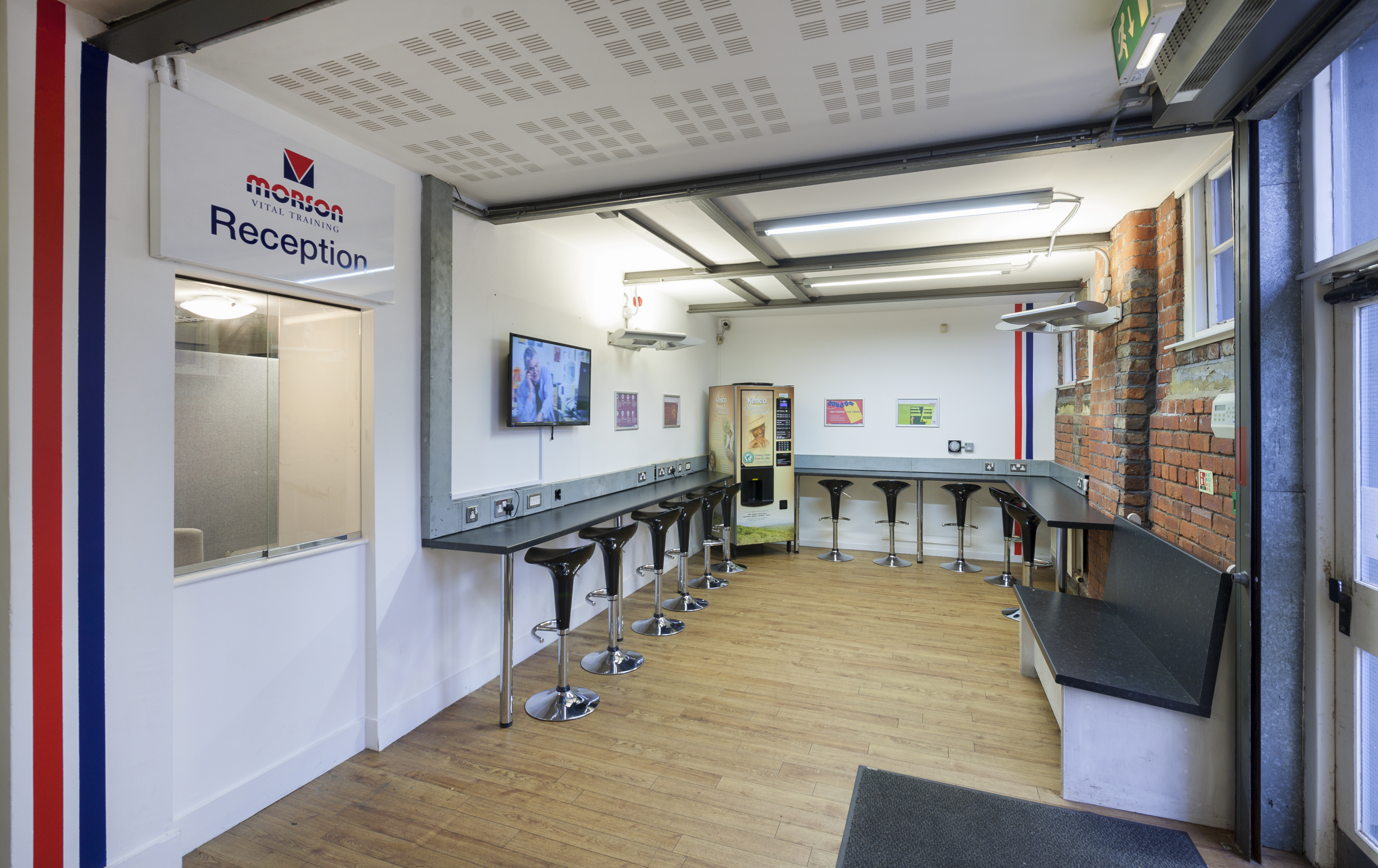 Modern training room reception with sleek seating for meetings and events.