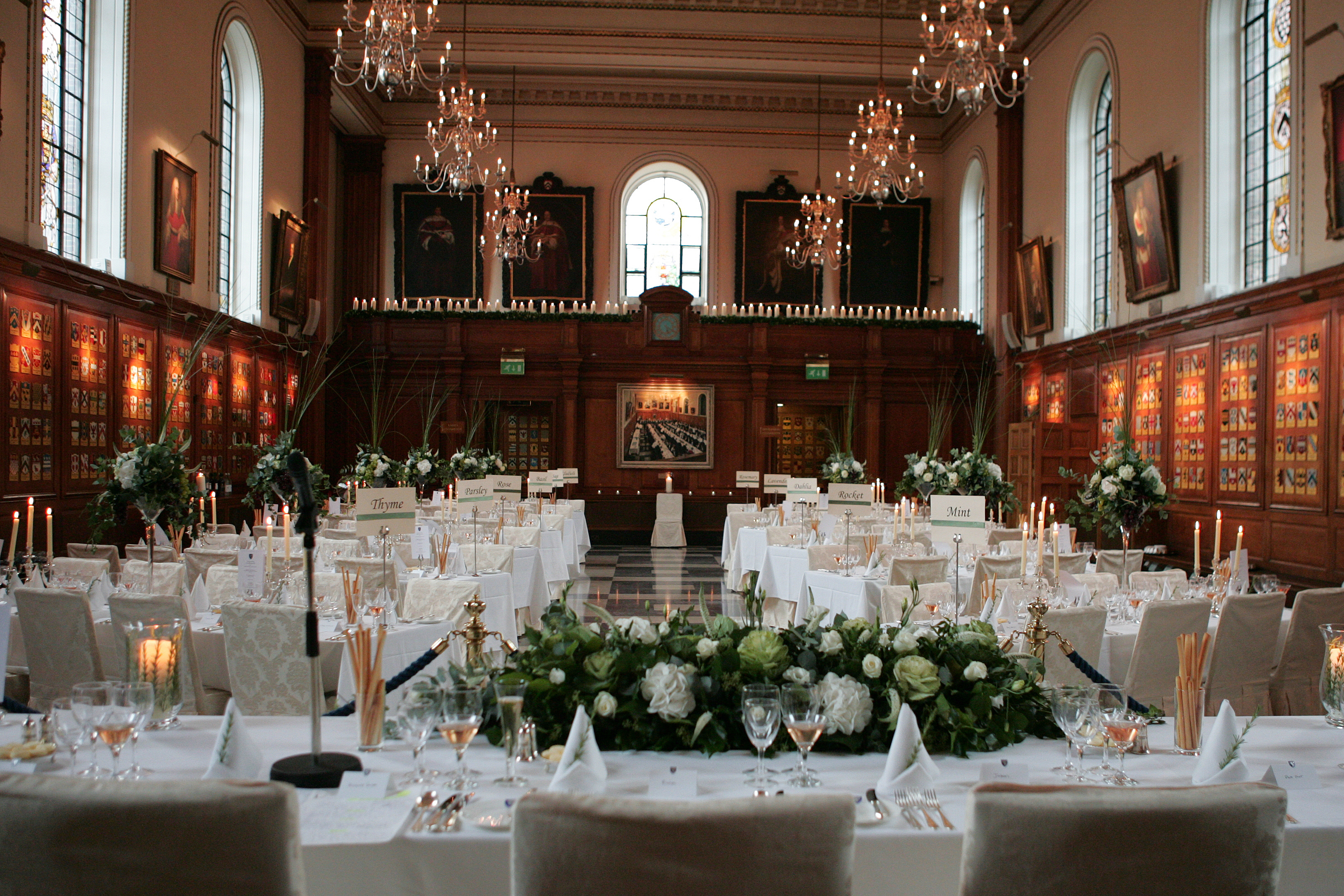 Elegant Inner Temple Hall banquet with chandeliers, perfect for weddings or corporate events.