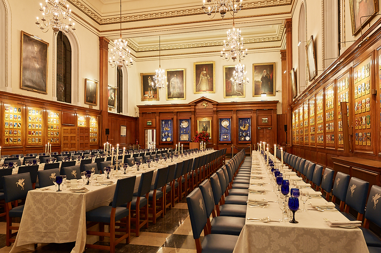 Elegant Inner Temple Hall banquet with white linens and blue glassware for upscale events.