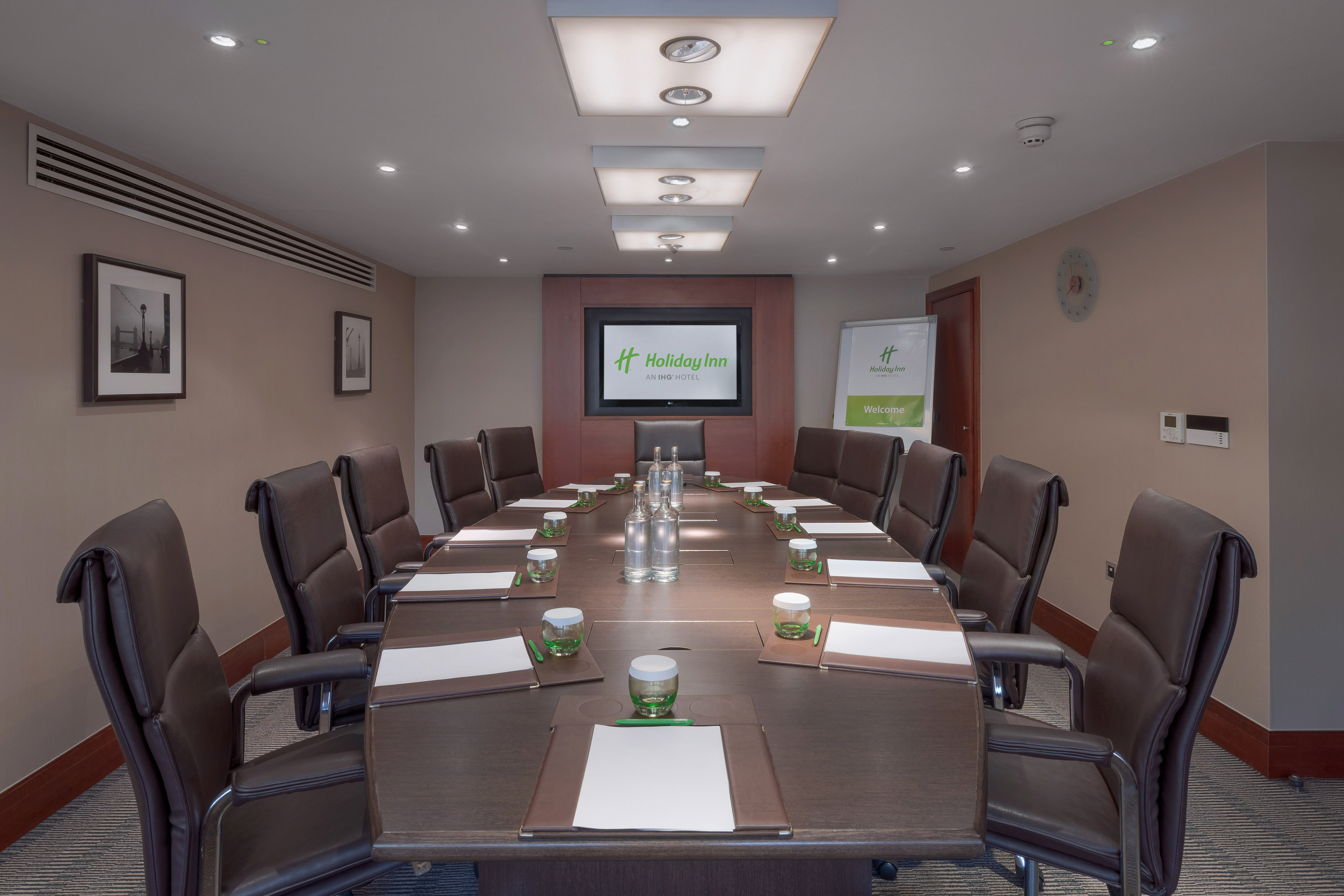 Executive Boardroom at Holiday Inn Kensington, featuring a long table for corporate meetings.