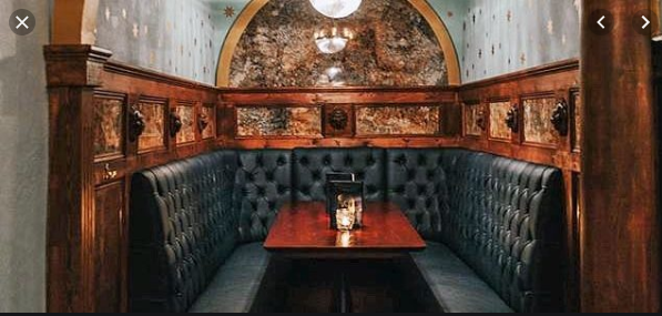 Intimate Grand Hall with plush leather seating for executive meetings and private events.