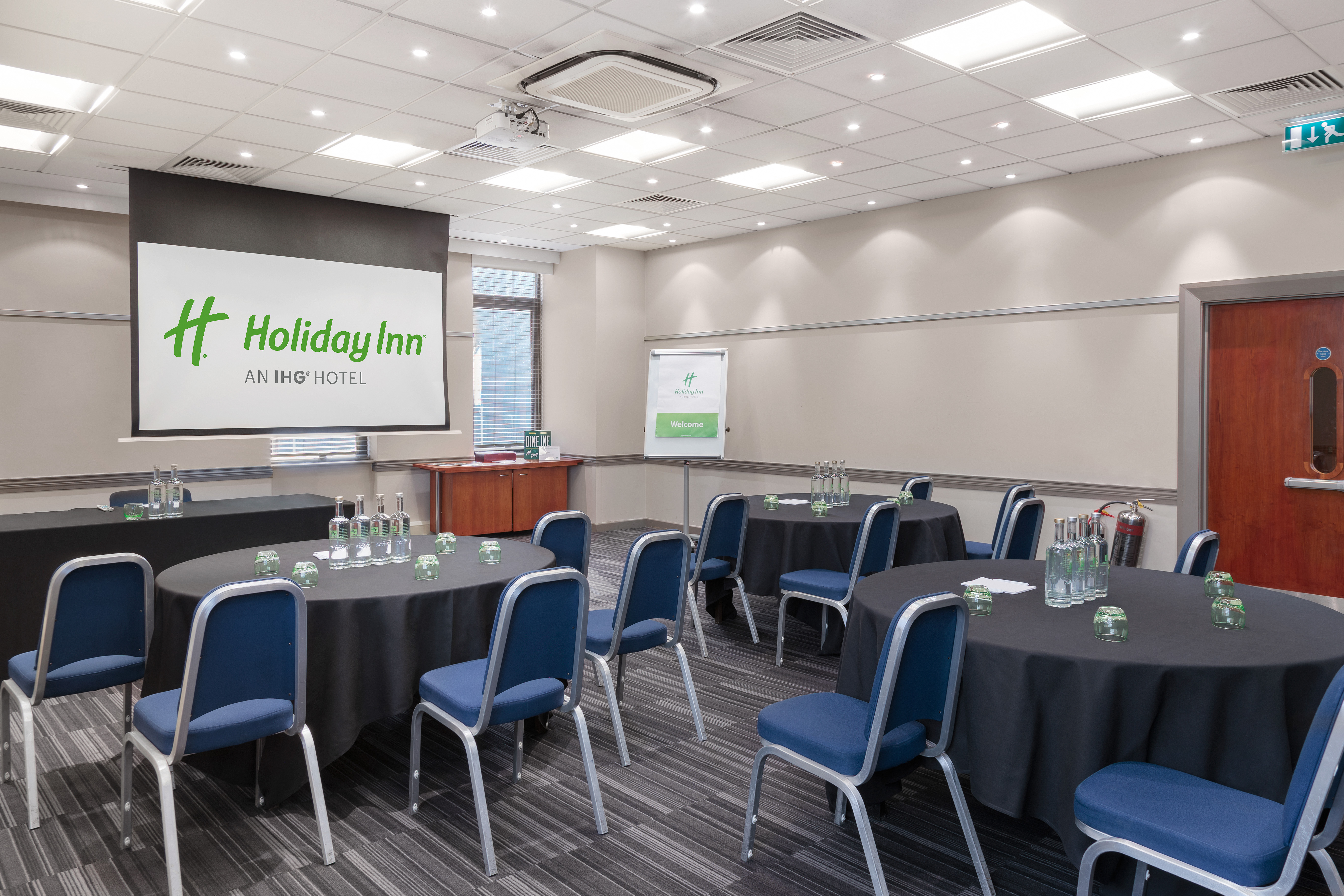 Modern meeting room at Holiday Inn Kensington, ideal for workshops and conferences.