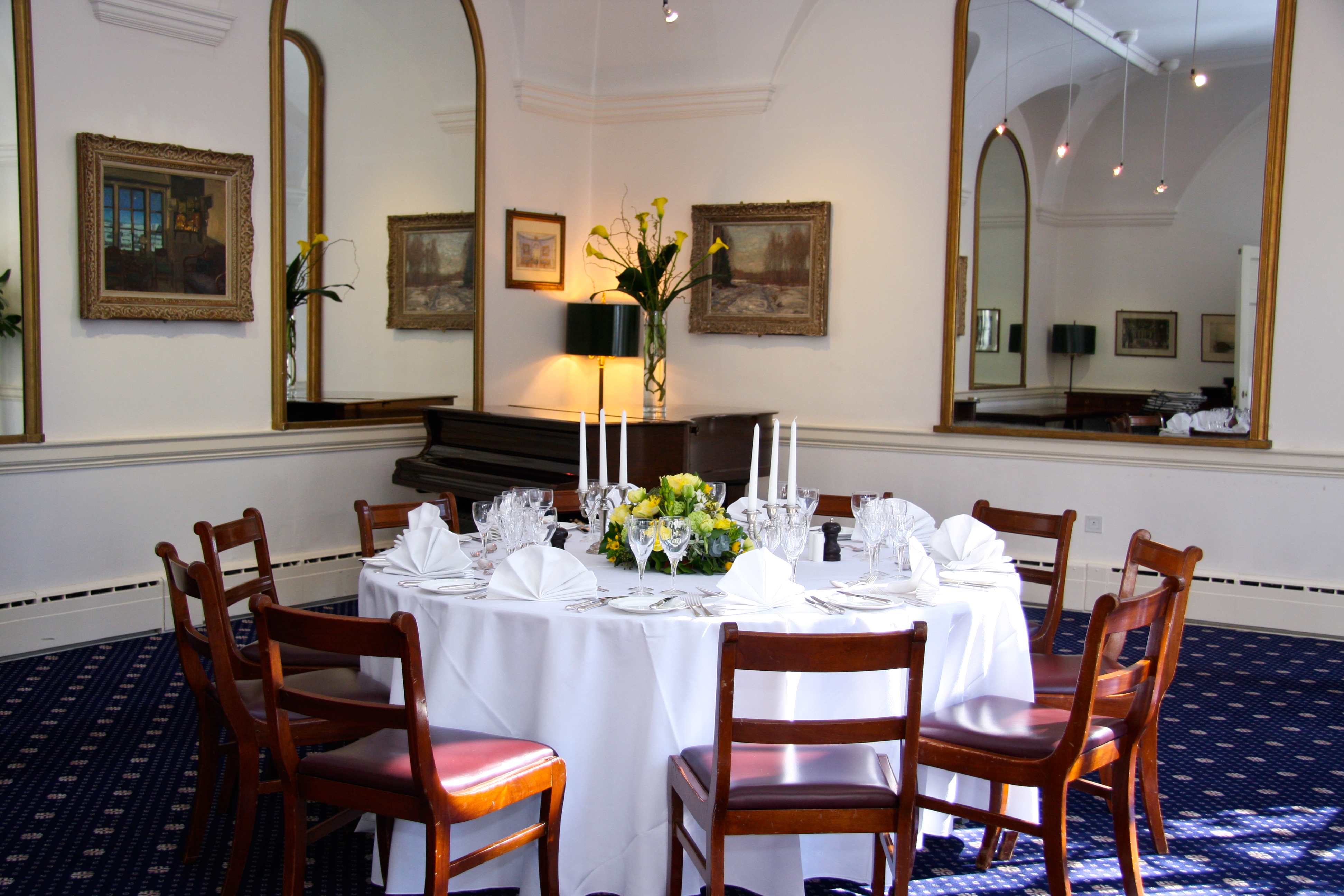 Elegant dining setup in The Solar Room & Garden for corporate events and gatherings.