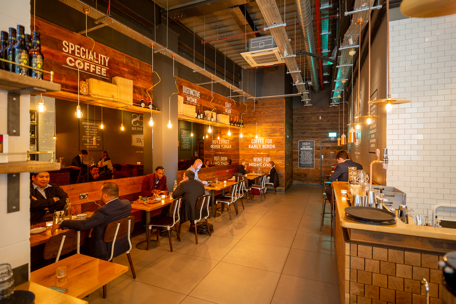 Modern venue with rustic decor, ideal for networking events and small meetings.