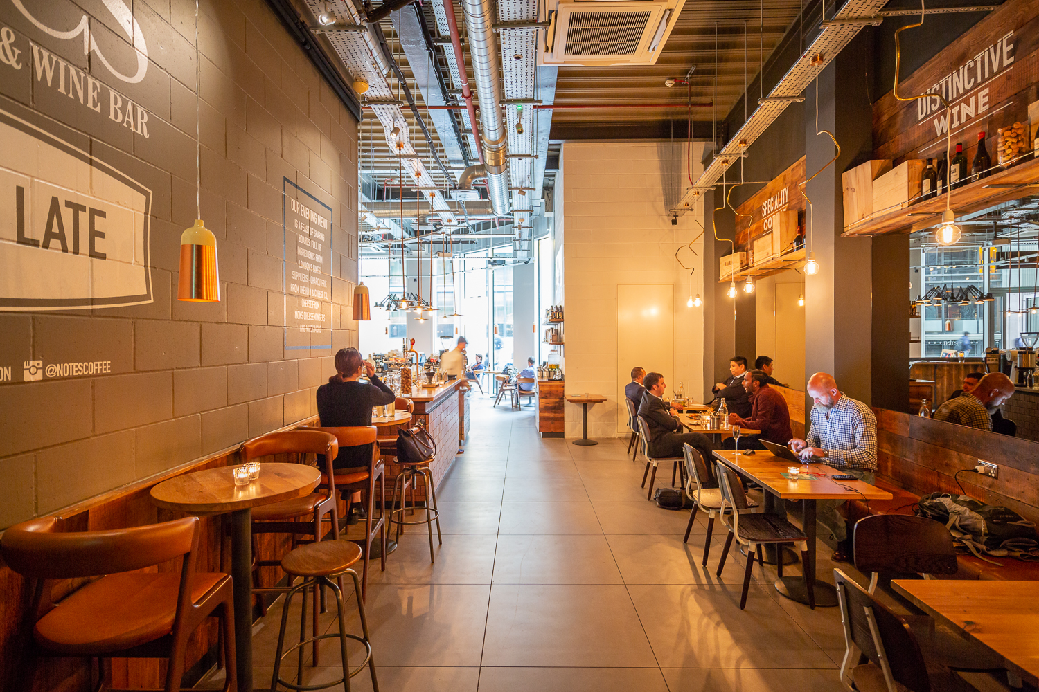 Modern venue in Notes Bank with warm lighting, ideal for networking events and meetings.