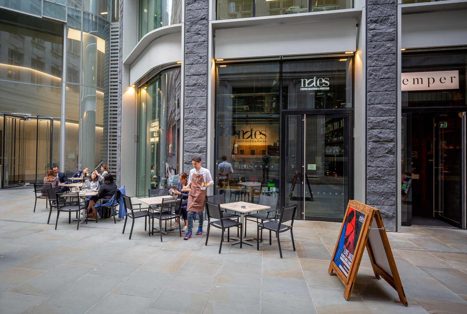 Vibrant outdoor dining area at Notes Bank, perfect for networking events and gatherings.