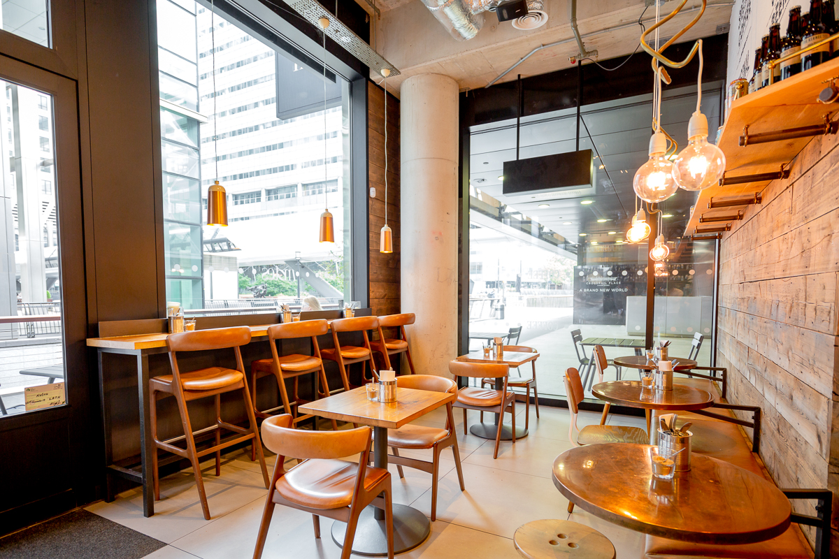 Modern café space in Everyman Canary Wharf, perfect for informal meetings and events.