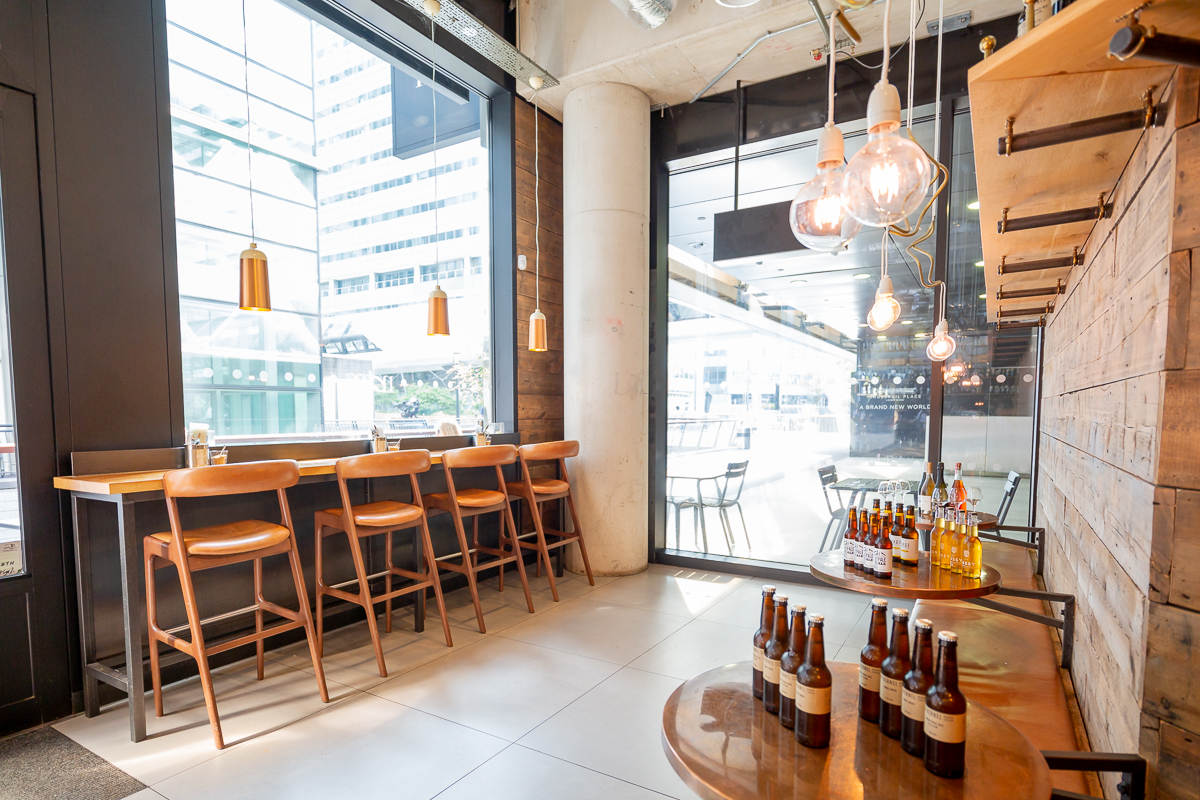 Modern meeting space with large windows for networking events at Everyman Canary Wharf.