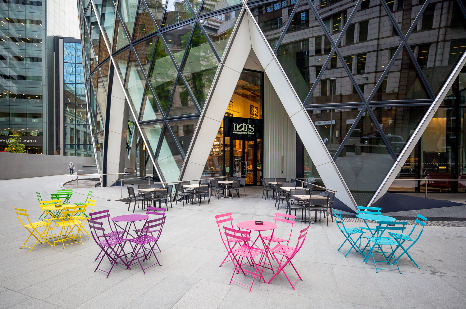 Vibrant outdoor seating at Notes Gherkin, ideal for networking events and casual meetings.