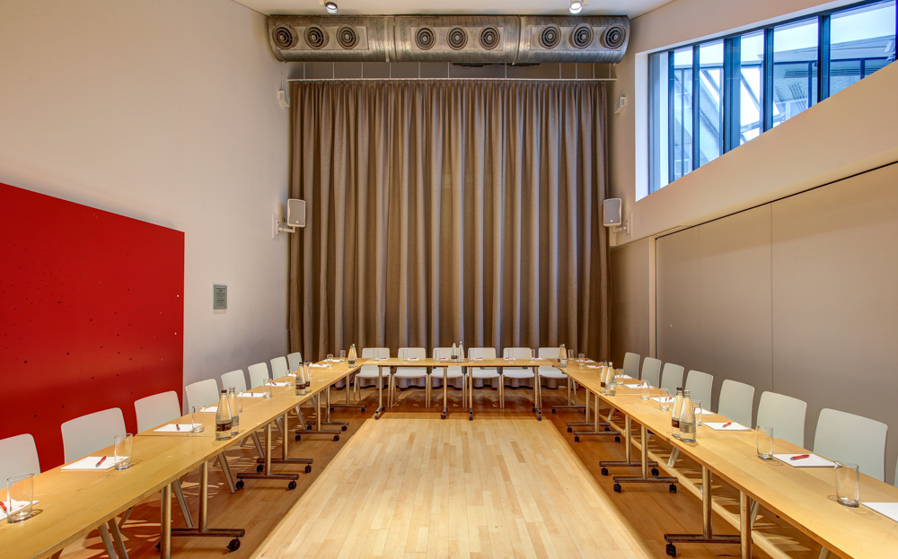 U-shaped meeting room at The Kahn, Sadler's Wells, ideal for workshops and strategic planning.