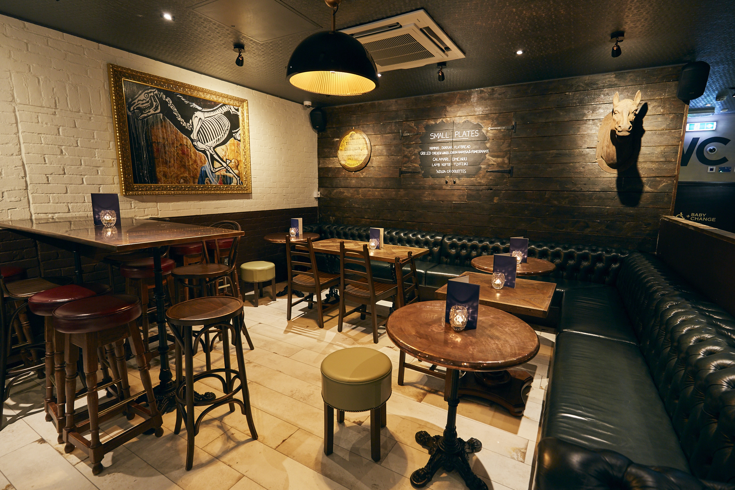 Cozy venue with warm lighting for cocktail receptions and networking events.