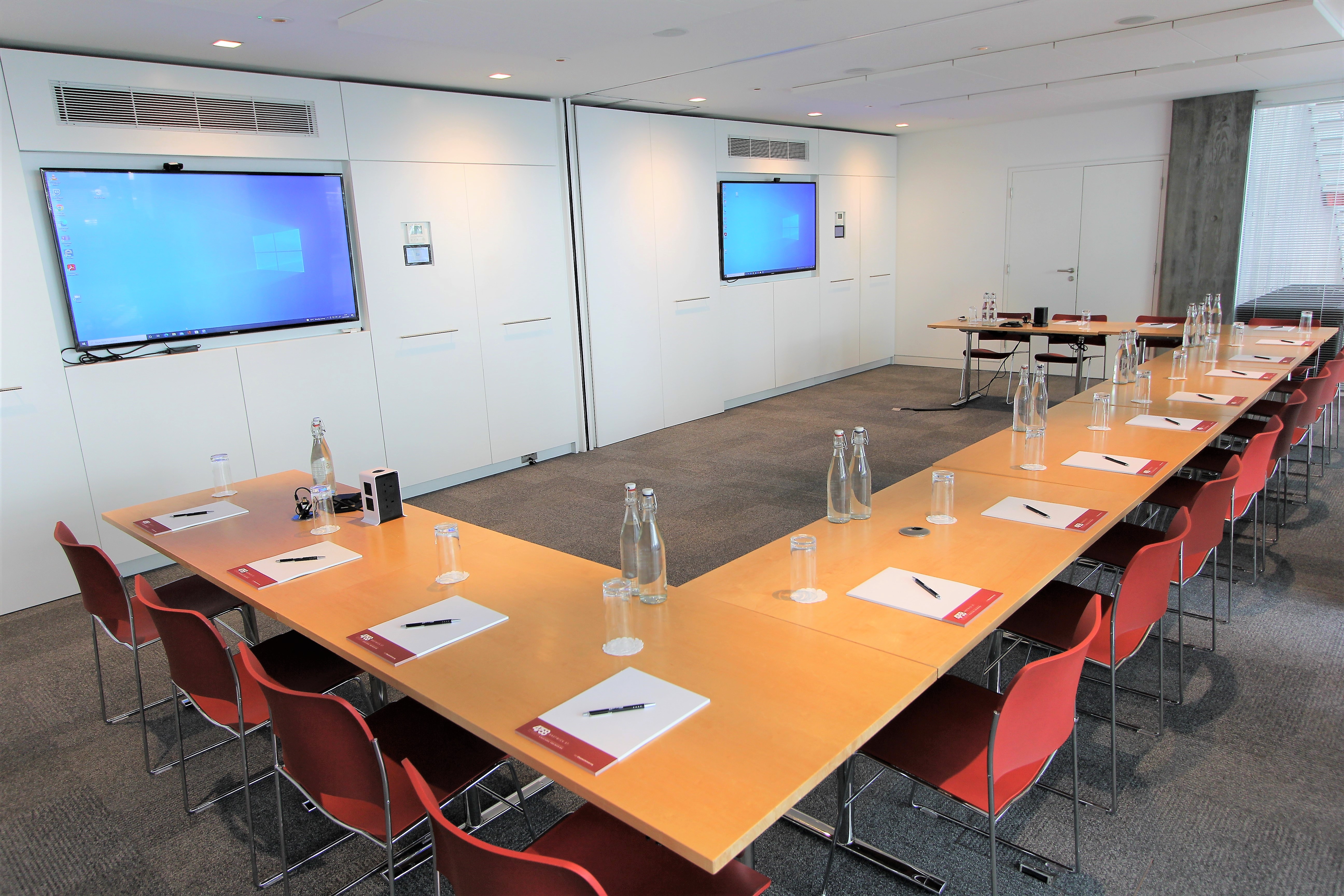 Belgrave Suite meeting room with U-shaped table, ideal for corporate events and presentations.