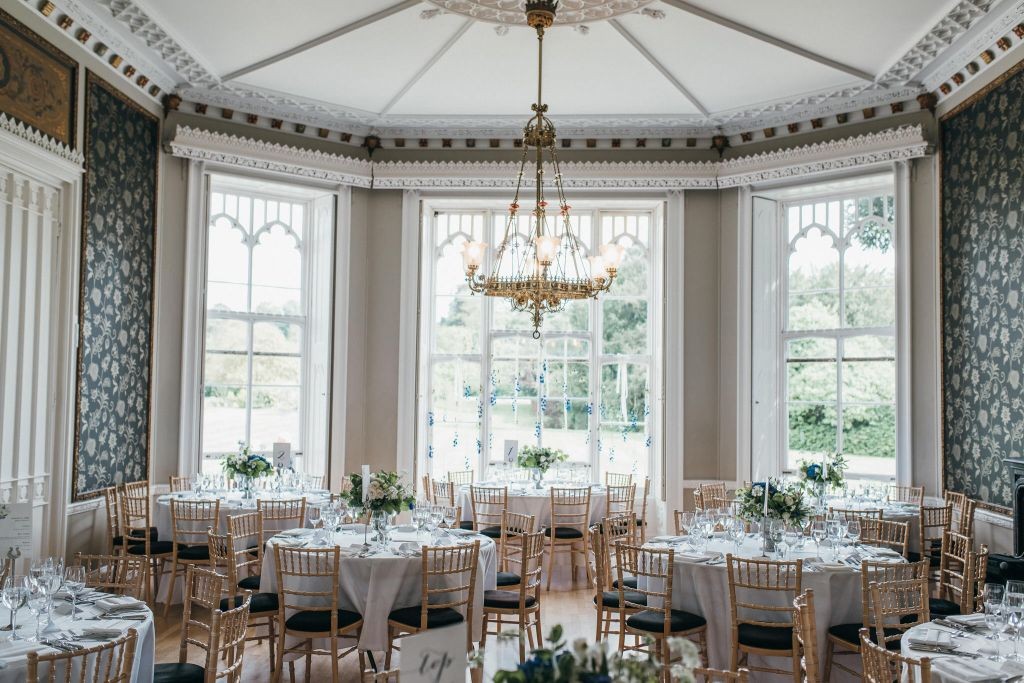 Elegant event space at Nonsuch Mansion with luxurious chandelier for weddings.