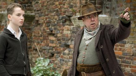 Two people discussing at Nonsuch Mansion, ideal for themed events and immersive experiences.