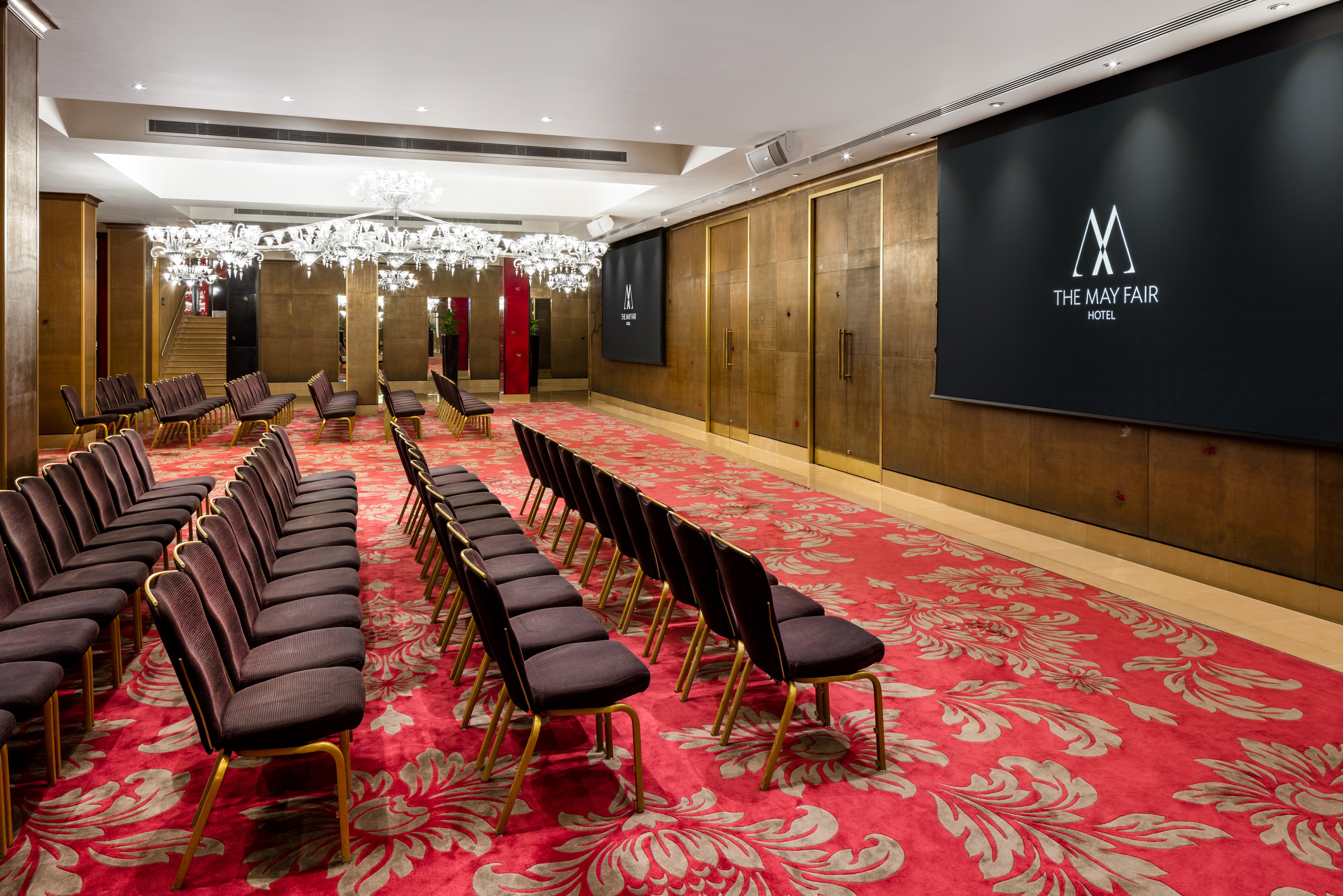 The Crystal Room at The May Fair Hotel, elegant meeting space for conferences and workshops.