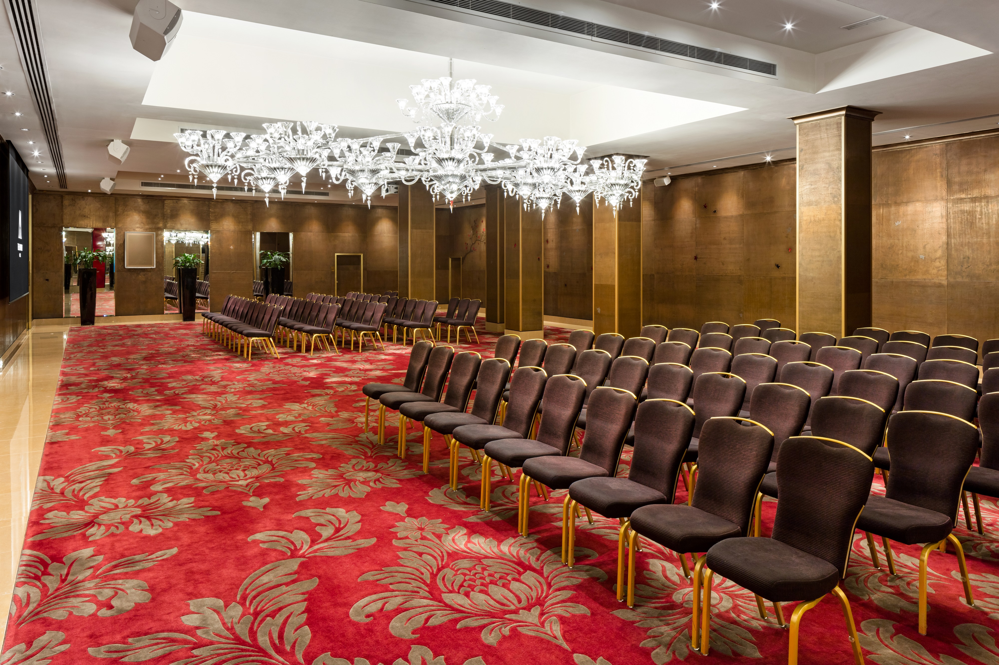 Elegant theater-style event space in The Crystal Room, ideal for conferences and gatherings.