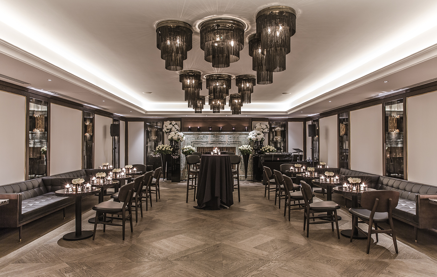 Private dining room at The May Fair Hotel with elegant lighting for upscale events.