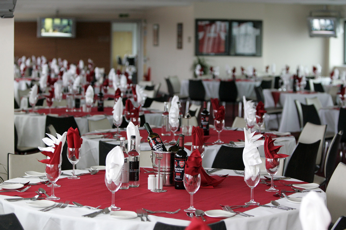 Olympic Suite at Leyton Orient FC, elegant dining setup for corporate events and banquets.
