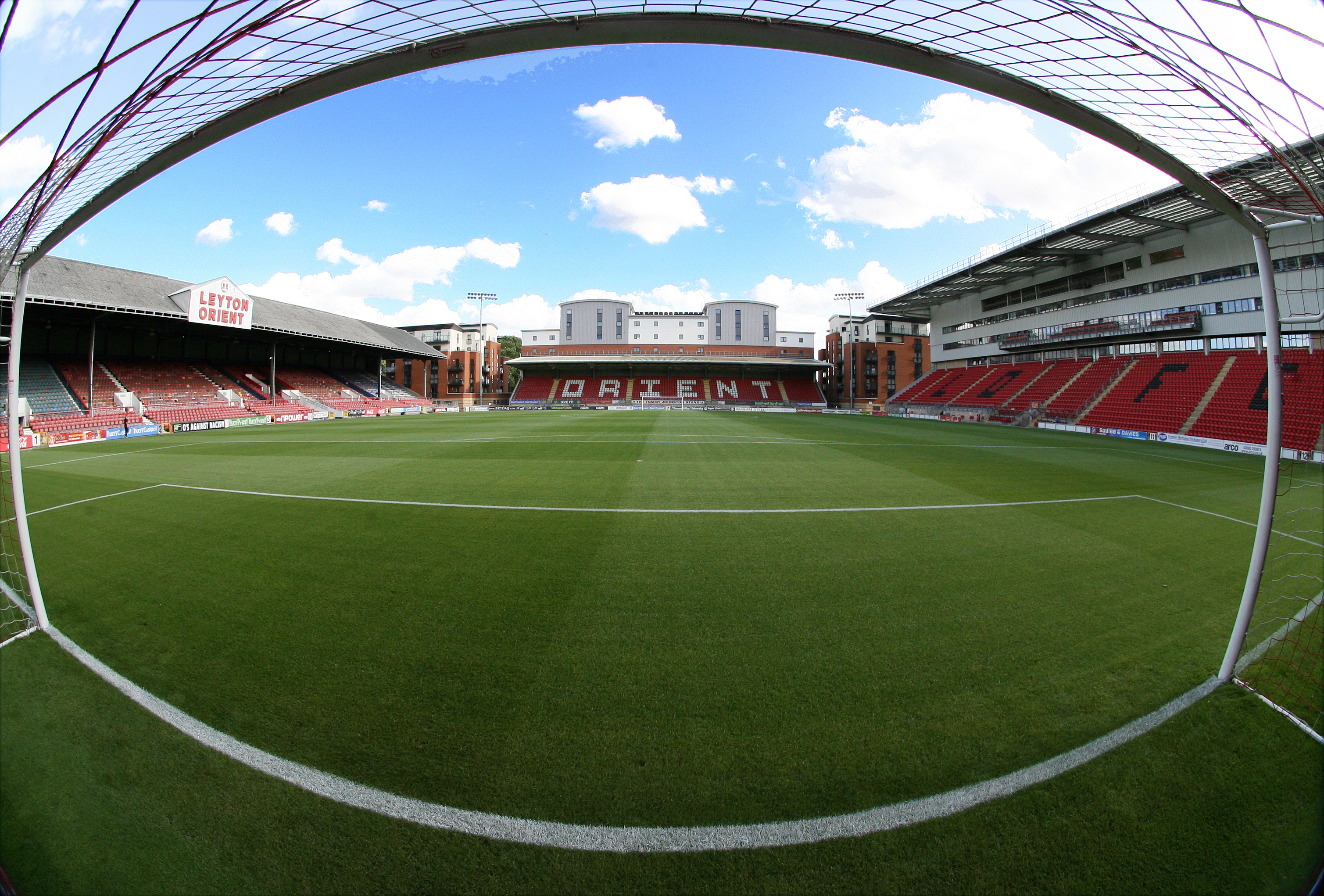 Olympic Suite at Leyton Orient FC with a green pitch, ideal for events and sports.