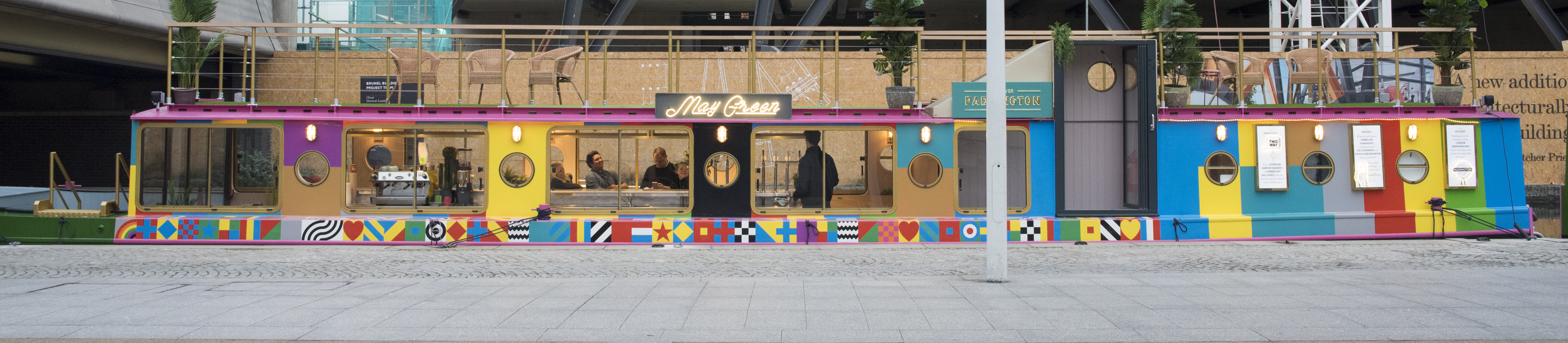 Vibrant MAY GREEN barge cocktails venue for casual networking and outdoor events.