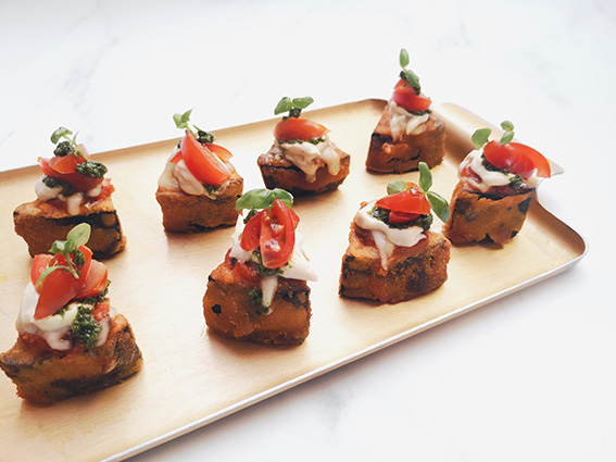Gourmet bruschetta platter for networking events and cocktail receptions.