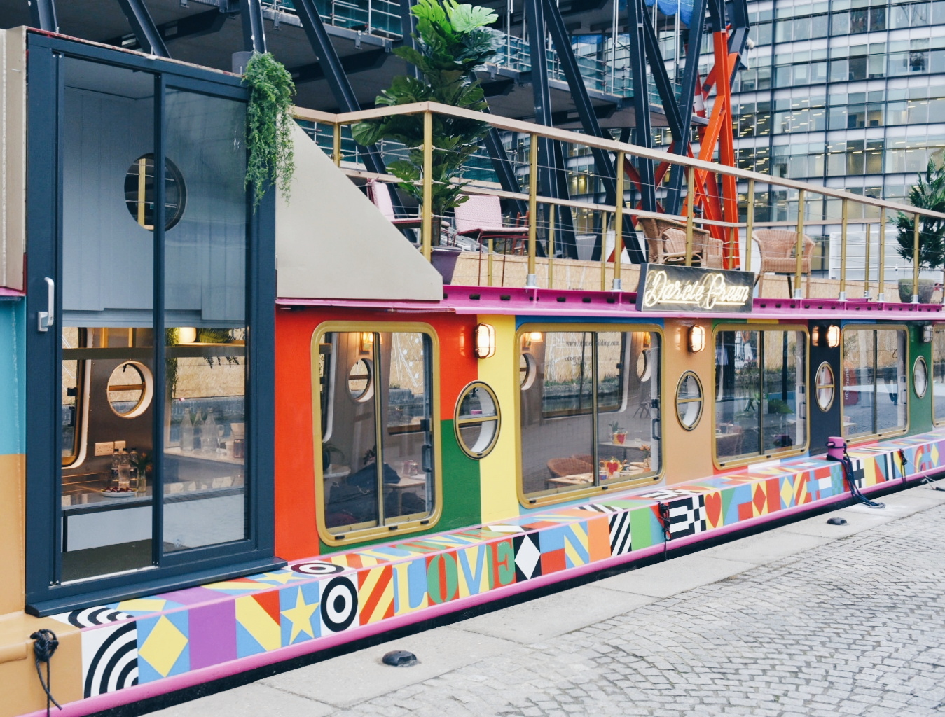 Colorful Double Boat Hire venue in Darcie & May for creative events and gatherings.