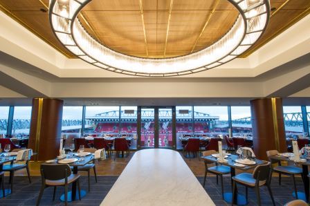 Executive Lounge at Liverpool FC: modern dining space with stadium views for corporate events.