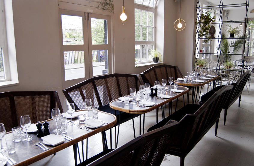 Stylish dining setup in Bourne & Hollingsworth for corporate events and gatherings.