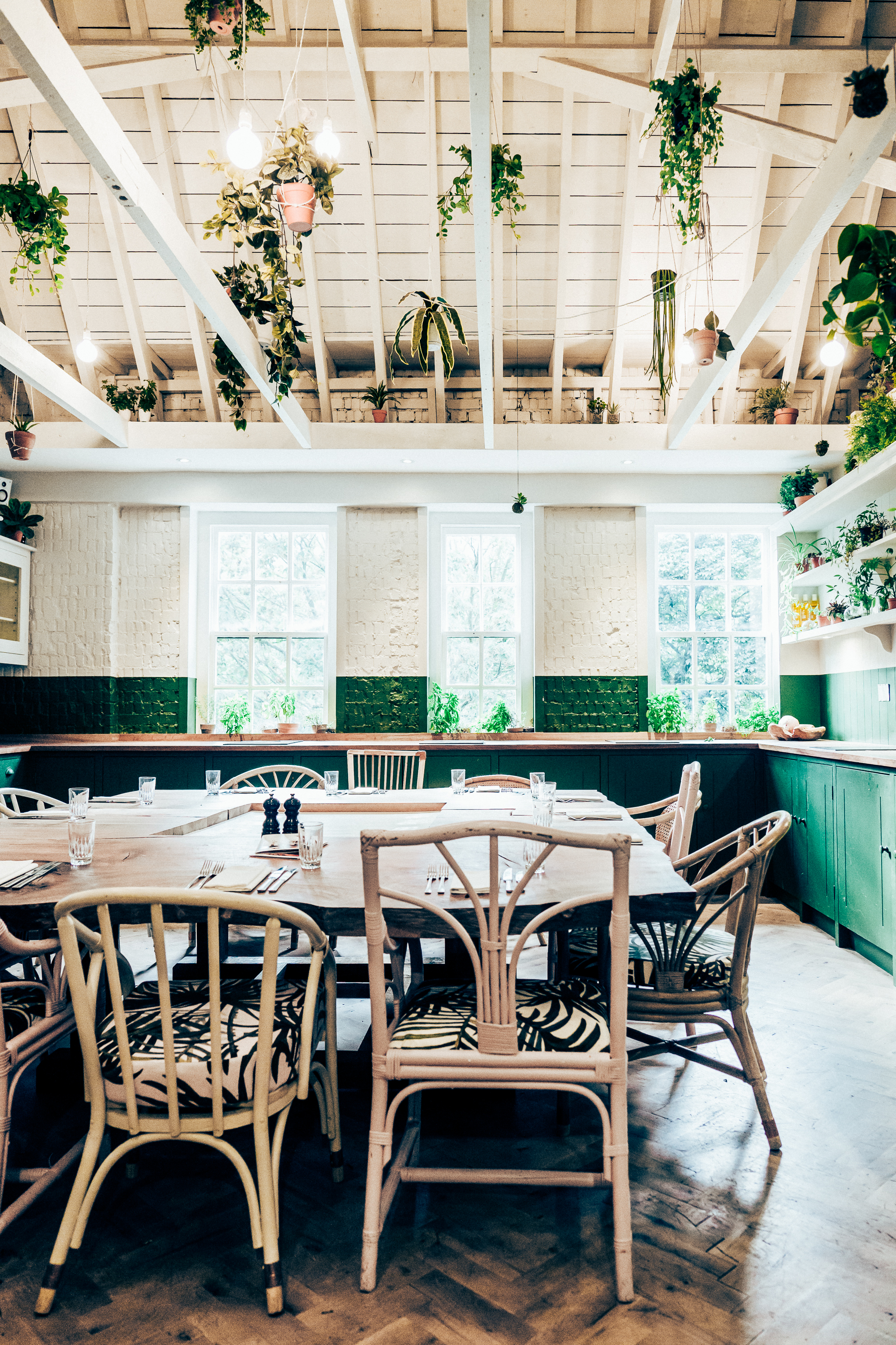 Bright meeting space at B&H Kitchen, ideal for workshops and gatherings with rustic decor.