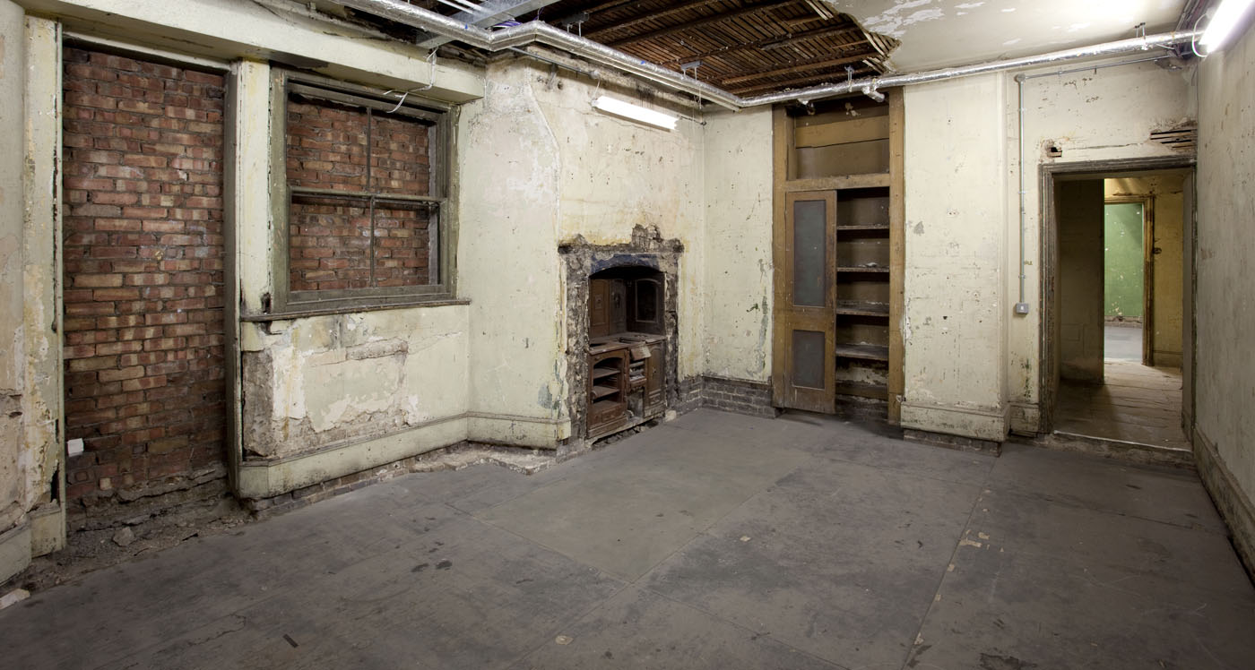 Dilapidated room in Shoreditch Town Hall, ideal for intimate events and creative workshops.