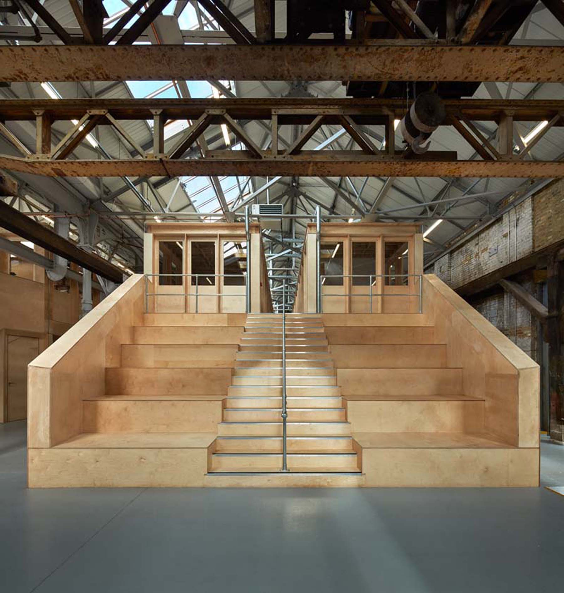 Exhibition Hall in Craft Central with wooden staircase, ideal for creative events and networking.