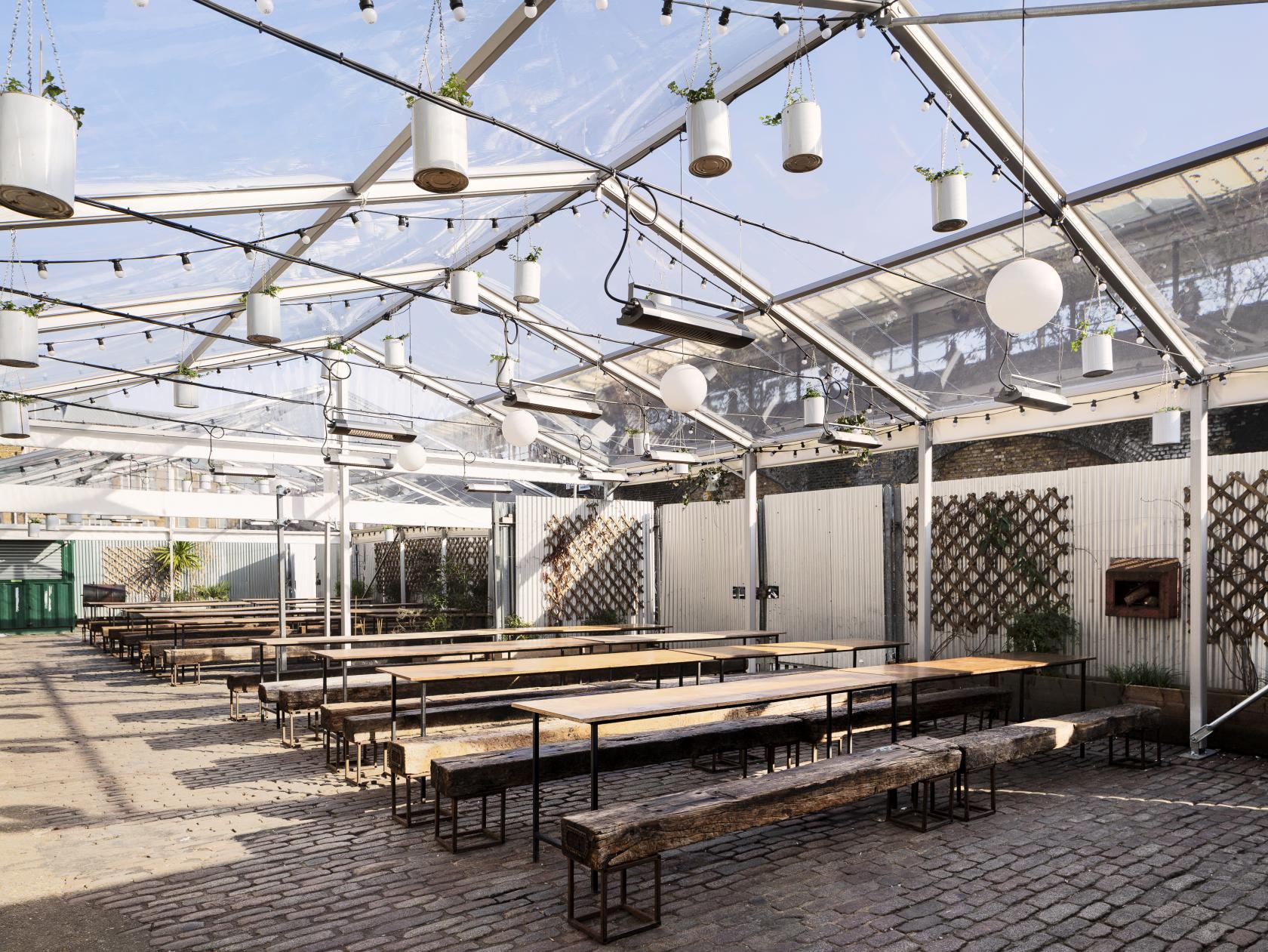 Clear-roofed Palm House in Peckham Springs, ideal for versatile outdoor events.