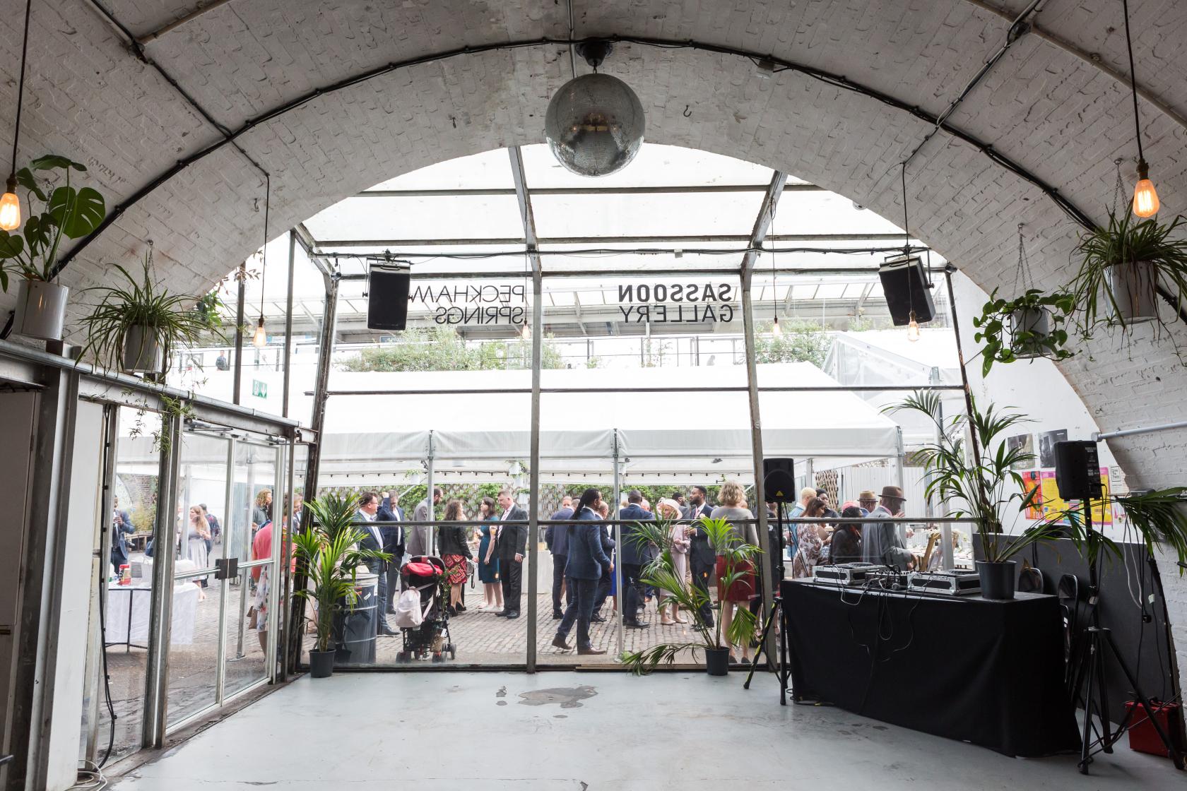 Chic event space at Springs Bar & Garden with large glass entrance for networking or celebrations.